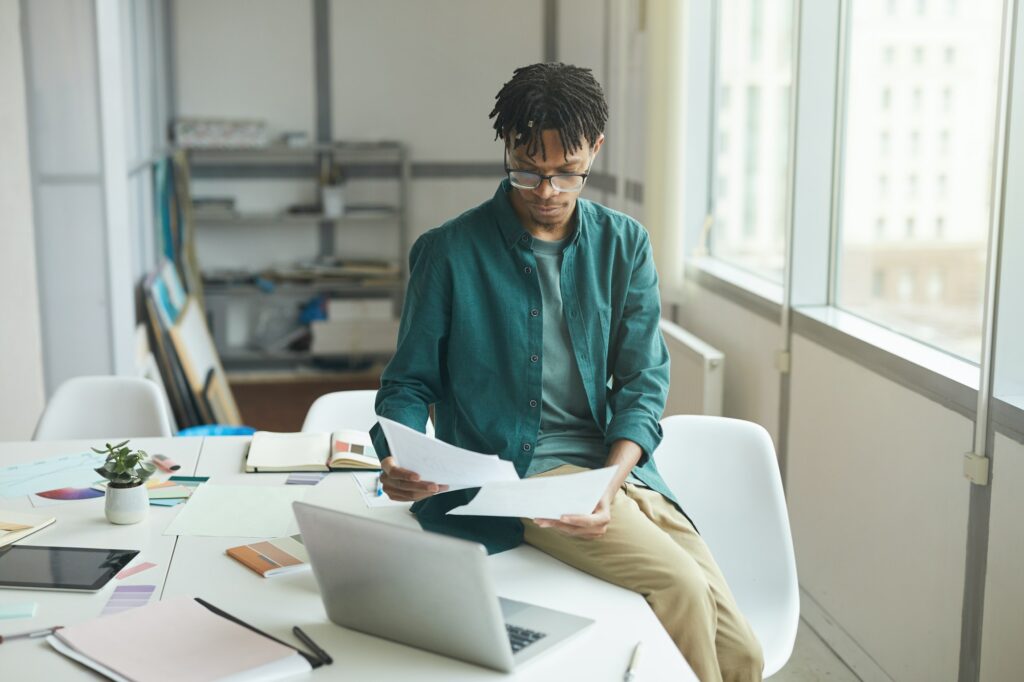 African businessman doing paperwork